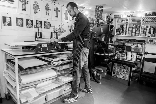 Fernando Feijoo working on an art piece